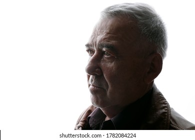 Portrait Of Old Man On White Background. Aged Male In Profile. Free Space For Text.