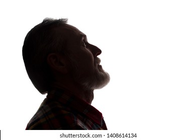 Portrait Of A Old Man, Unshaven, With Beard, Side View - Dark Isolated Silhouette