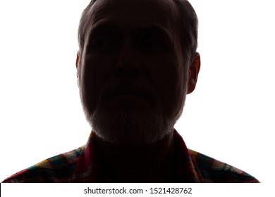 Portrait of a old man, unshaven, with beard, front view - dark isolated silhouette