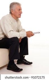 Portrait Of An Old Man Watching Tv