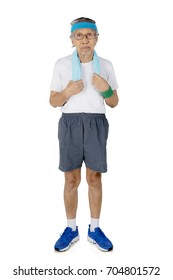 Portrait Of An Old Man Wearing Sportswear While Looking At The Camera, Isolated On White Background