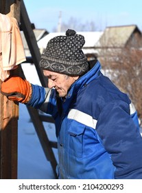 Portrait Of Old Russian Man Looking Left, Tired Of Work