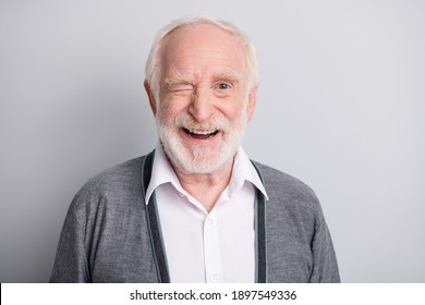 Portrait Of Old White Hair Optimistic Man Blink Wear Dark Sweater Isolated On Grey Background