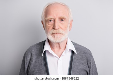 Portrait of old white hair sad man wear dark sweater isolated on grey background