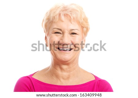 Portrait of an old woman in pink shirt. isolated on white. 