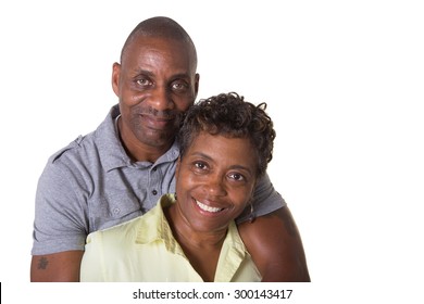 Portrait Of An Older Couple Facing Embracing, Isolated