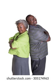 Portrait Of An Older Couple Standing Back To Back Isolated