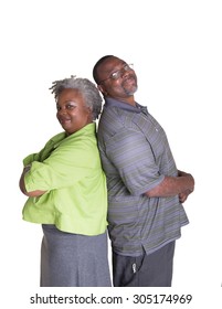 Portrait Of An Older Couple Standing Back To Back Isolated