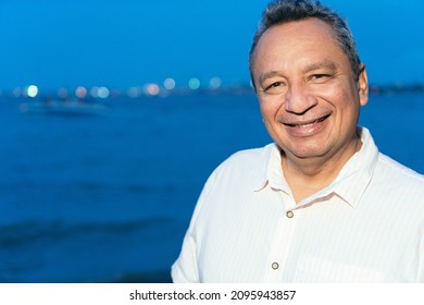 Portrait Of An Older Latina Man In The Park