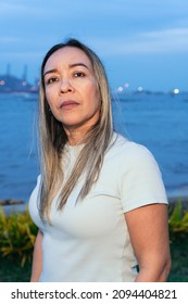 Portrait Of An Older Latina Woman In The Park