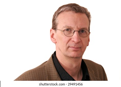 Portrait Of Older Man With Glasses In Sports Coat Against A White  Background