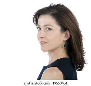 Portrait On White Background Of A Forty Years Old Woman In Studio