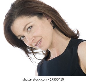 Portrait On White Background Of A Forty Years Old Woman In Studio