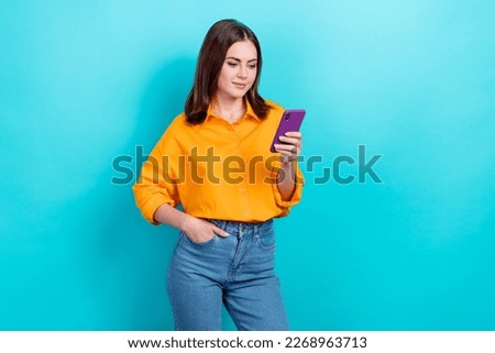 Portrait of optimistic girl bob hairstyle dressed yellow shirt instagram twitter whatsapp facebook isolated on blue color background