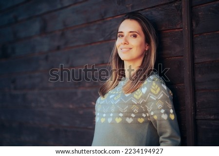 
Portrait of an Optimistic Woman Smiling Wearing Cool Sweater. Happy charismatic lady in knitwear fashion item
