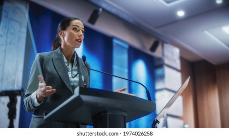 Portrait of Organization Female Representative Speaking at Press Conference in Government Building. Press Office Representative Delivering a Speech at Summit. Minister Speaking to Congress Hearing. - Shutterstock ID 1974026258