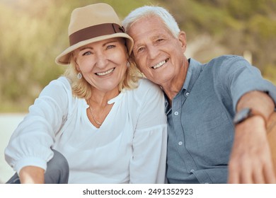 Portrait, outdoor and senior couple with love, smile and retirement with vacation, getaway trip and travel. Face, old man and mature woman in park, holiday and romance with care, happiness and break - Powered by Shutterstock