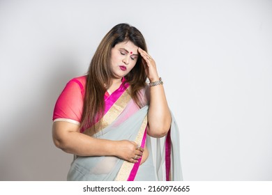 Portrait Of Overweight Indian Woman Wearing Saree Isolated On White Background, Asian Stressed Mature Lady Hand On Head.