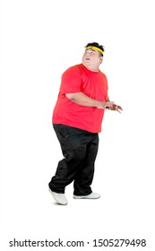 Portrait of an overweight man wearing sportswear while running with fear expression, isolated white background