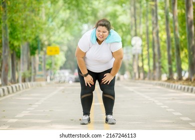 Portrait Overweight Woman Catching Breath After Stock Photo