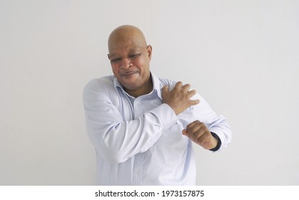 Portrait Of Painful Senior Old Elderly Business Black African American Man Person Has Shoulder Pain Isolated On White Background. Hurt