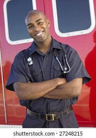 Portrait Of Paramedic In Front Of Ambulance