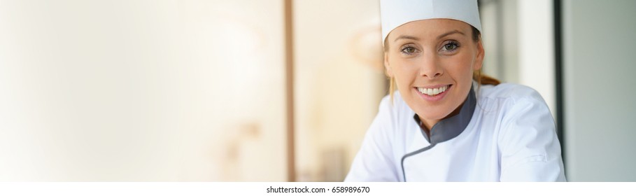 Portrait Of Pastry Chef Standing By Raspberry Cake, Template