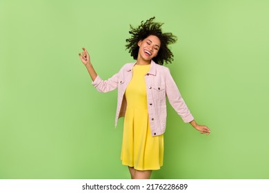 Portrait of peaceful positive lady closed eyes have fun clubbing weekend isolated on green color background - Shutterstock ID 2176228689