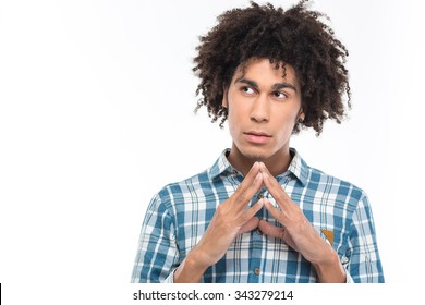 Portrait of a pensive afro american man with curly hair looking away isolated on a white background