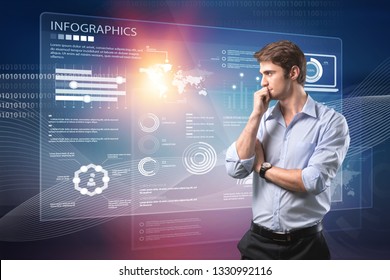 Portrait of a pensive young business analyst standing against a dark background with graphs and infographics. Toned image. Elements of this image furnished by NASA - Powered by Shutterstock