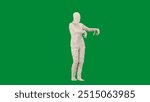 Portrait of person in a mummy bandage on chroma key green screen background. Mummy covered in white cloth ribbons walking with hands up.