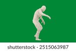 Portrait of person in a mummy bandage on chroma key green screen background. Mummy covered in white cloth ribbons walking with hands up.