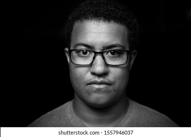 Portrait Of Person On Black Background