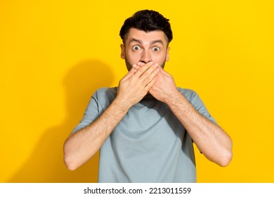 Portrait Photo Of Funny Impressed Brunet Man Bristle Cover Mouth Hands Unexpected Reaction Crazy Mistake Work Fail Isolated On Yellow Color Background