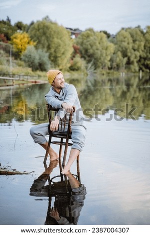 Similar – Portrait of a young man in nature