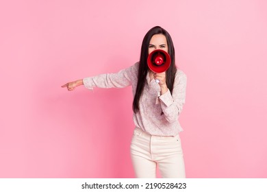 Portrait photo of young funny angry activist woman directing finger empty space trash street eco friendly isolated on pink color background