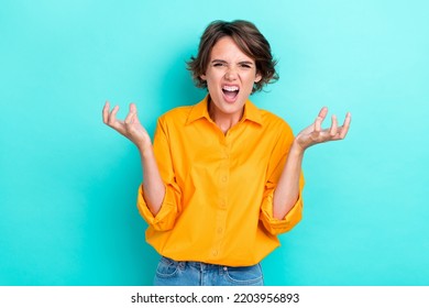 Portrait Photo Of Young Funny Reaction Girl Wear Smart Casual Bright Shirt Crazy Angry Reaction Problem Isolated On Aquamarine Color Background