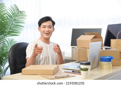 Portrait Photo Of A Young Handsome Asian Adult Man, Livestream To Sell Goods Online, Concept Of Personal Commerce Reseller Business Of Digital Life 