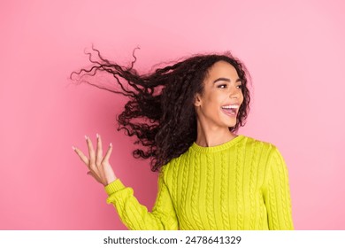 Portrait photo of youth model teenager girl promoting new trend touching hair after shampoo for curly hairstyle isolated on pink color background - Powered by Shutterstock