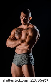 Portrait Of A Physically Fit Man Showing His Well Trained Body