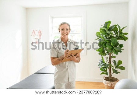 A Portrait of a physiotherapy woman smiling in uniforme