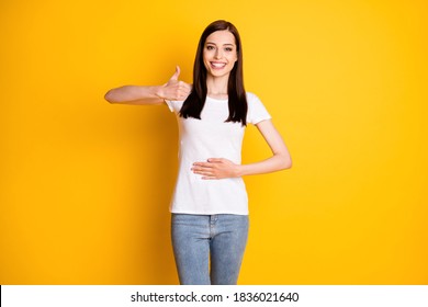Portrait of positive cheerful girl touch hand abdomen enjoy healthy, digestive nutrition show thumb up sign wear white denim isolated over shine color background - Shutterstock ID 1836021640