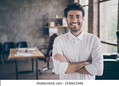 Portrait of positive cheerful middle eastern entrepreneur cross his hands feel real successful start-up owner in enterprise office