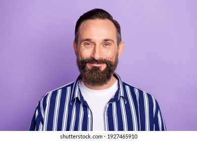 Portrait Of Positive Mature Man Smiling In Camera Isolated Over Violet Color Background