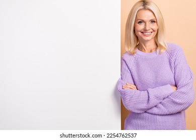 Portrait of positive nice person toothy smile crossed arms empty space blank isolated on beige color background - Shutterstock ID 2254762537