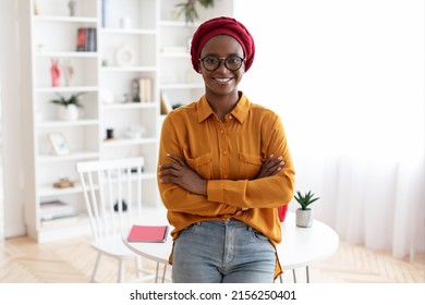 Portrait Of Positive Young Muslim African American Lady In Casual Outfit And Eyeglasses Freelancer Posing At Workplace At Home, Looking At Camera And Smiling, Panorama With Copy Space. Career Concept