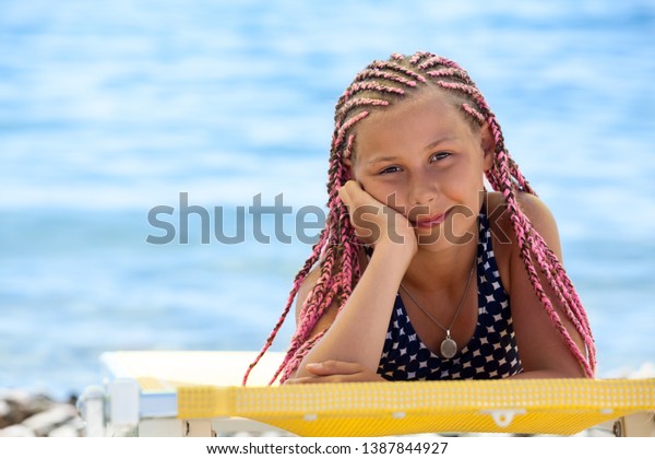 Portrait Of Caucasian Preteen Girl Looking At Viewer 