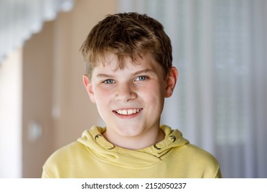 Portrait Of Preteen School Kid Boy. Beautiful Happy Child Looking At The Camera. Schoolboy Smiling. Education Concept.