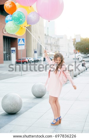 Similar – Young teenage girl blowing pink bubble gum