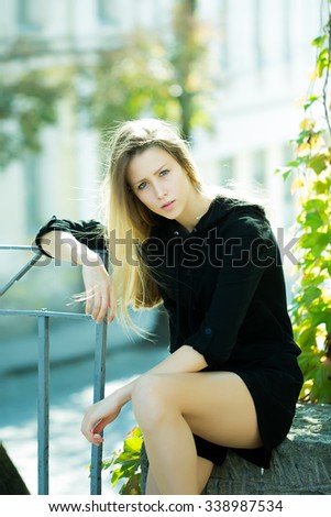 Similar – Image, Stock Photo Smiling young woman in urban background